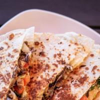 Chando'S Quesadilla · Select your favorite of chando's signature meat (1 Selection) and enjoy it sandwiched betwee...