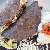 Quesadilla Chilangas · A variation of a taco, made from a grilled crisp handmade corn tortilla with a mix of Mexica...