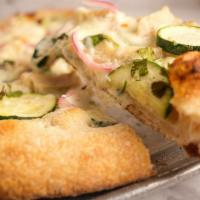 Isabela'S Lemon Chicken Pizza · Chicken Marinated in lemon over our homemade Alfredo sauce with squash, purple onion and cil...