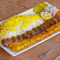 Ground Beef And  Ground Chicken Combination · One skewer of charbroiled ground beef kabob and one skewer of ground chicken kabob served wi...