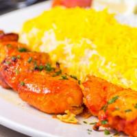 Boneless Chicken Kabob · Skewered charbroiled marinated skinless boneless chicken served with broiled tomato, vegetab...