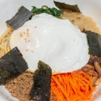 Bibim Bap · Cooked seasoned vegetables, fried egg and ground beef
