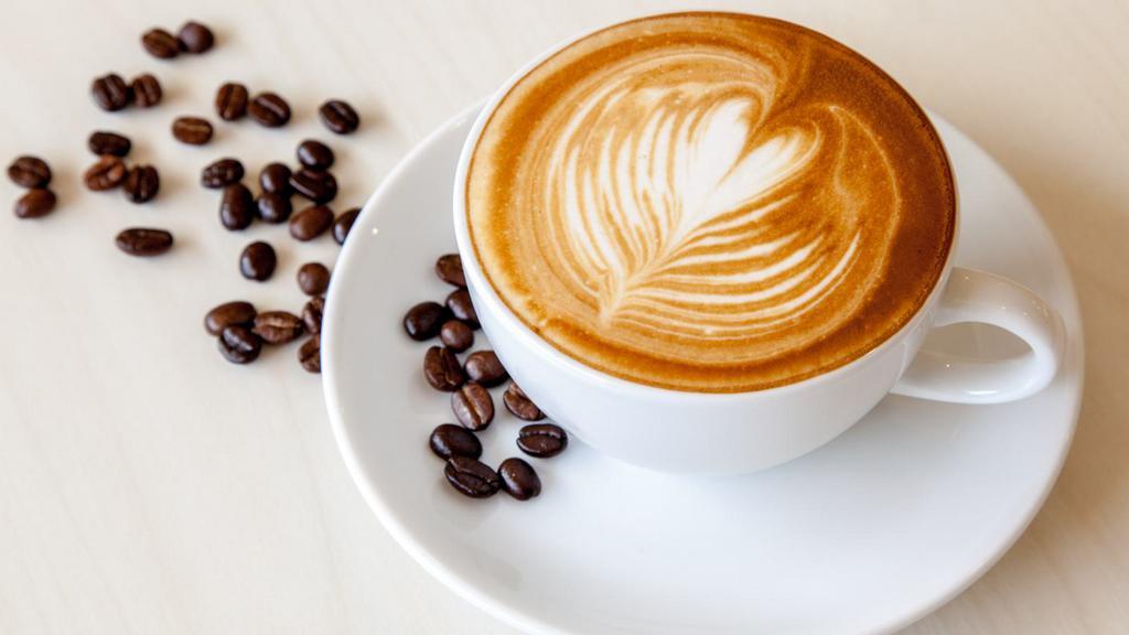 Cafe Latte · Deep, dark espresso shots with steamed
milk. Choose one of our tempting flavors.