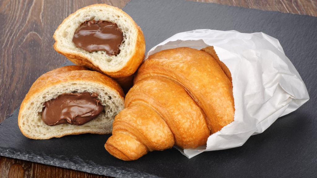 Croissant · Flaky and buttery croissant.