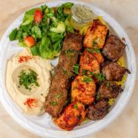 Mix Grill Plate · A combination for meat lovers, This plate includes Three pieces of chicken kabab, Three piec...
