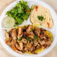 Chicken Shawarma Plate · Our marinated and flame-broiled chicken is always fresh, natural and hand-cut. Served with a...