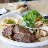 Shawarma Mix Plate · This combo comes with both the chicken and tri-tip Shawarma and served with sides of garlic ...