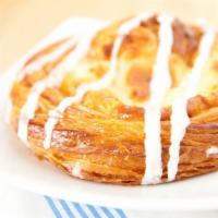 Cinnamon Roll · Gooey, soft, freshly baked cinnamon roll with a thick layer of sweet icing.