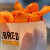 Beer Battered Potatoes · spiral cut, beer battered, fried crispy, dusted w/ our house seasoning. Plain available upon...