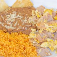 Huevos Con Jamon · Ham & eggs scramble served with rice and refried pinto beans and tortillas.