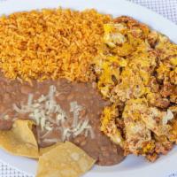 Huevos Con Chorizo · Mexican sausage & eggs scramble served with rice, beans and tortillas.