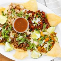 Taco- Chico/Small (Street Tacos) · Choices of meat; carne azada, carnitas, al pastor, pollo azado, chorizo, buche all tacos com...