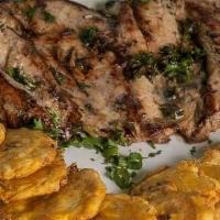 Pechuga Asada · Marinated grilled chicken breast served with rice, beans and tortillas.