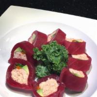 Red Velvet · In: Snow Crab, Gobo, Avocado, and Radish sprout. Top: Masago, Green Onion, and Spicy soy mus...