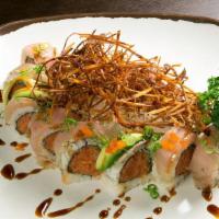 Albacore Delight · In: Spicy Tuna and Cucumber.Top: Albacore, Avocado, Fried onion, Masago, Green Onion and Soy...