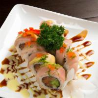 Crazy Monkey · In: Salmon and Cucumber. Top: Yellowtail, Avocado, Green Onion, Masago, Eel Sauce, and Wasab...