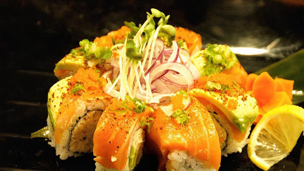 Cajun Salmon · In: Crab meat and Fried Asparagus. Top: Cajun seared salmon, Avocado, Red onion, Masago, Green onion, Spicy Mayo.