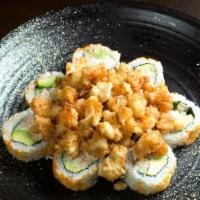 Popcorn Lobster · In: Crab meat and avocado. Top: Fried crawfish, masago, green onion, and eel sauce.