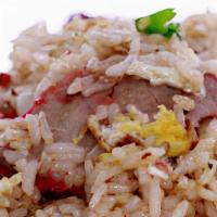 Bbq Pork Fried Rice · red BBQ pork, peas &
carrot, onions, green onions and BBQ powder.
