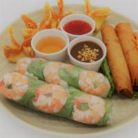 Appetizer Trio - Khai Vị Đạc Biệt · 2 spring rolls, 2 egg rolls, 4 shrimp torpedoes.