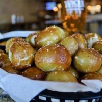 Original Pretzel Bites · Bite-size pretzels baked with grain from our brewhouse. Salted & served with homemade pesto ...