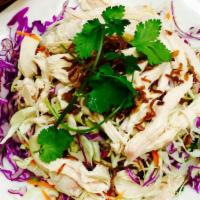 Chicken Salad / Gỏi Gà · Shredded steamed chicken with cabbage, mints, onion, and fried onion. Served with shrimp chi...