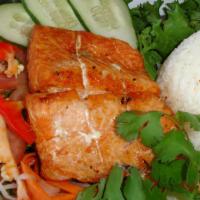 Fried Or Grilled Salmon Rice/ Cơm Cá Salmon (Chiên/ Nướng) · With chopped lettuce, cucumber, bell pepper, onion, mushroom, and steamed rice.