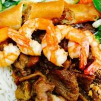 Combo Vermicelli / Bún Tôm Thịt · With shrimp, egg roll, and one choice of either beef, pork, or chicken. /  Bò, heo, or gà) n...