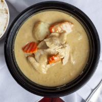 Yellow · Yellow curry paste in coconut milk with onions, carrots, and potatoes with your choice of me...