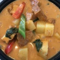 Pineapple · Red curry paste in coconut milk with onions, pineapple, bell pepper, and basil with the choi...