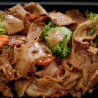 Pad See Ew · Pan-fried flat rice noodle with meat, broccoli, carrot, and egg.
