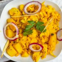 Aloo Gobhi · Cauliflower and potatoes with curry mix.