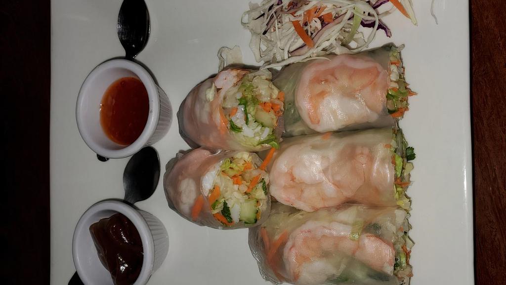 Fresh Spring Roll · Tofu or shrimp, lettuce, carrot, cucumber, mint, cilantro, rice noodles wrapped in rice paper served with crushed peanuts tangy sauce.