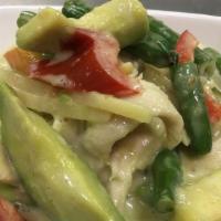 Chicken & Green Avocado Curry · Chicken in green curry sauce, fresh avocado, bell pepper, zucchini, green bean, and basil.