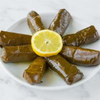 Grape Leaves · A side of grape leaves (8) stuffed with rice and a mix of authentic Mediterranean herbs and ...