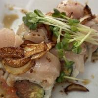 Garlic Albacore Roll · In - spicy tuna, cumber. 
Out - albacore, fried garlic with garlic ponzu.