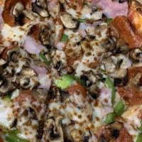 Classic Pizza · Classic: Green pepper, Ham, Pepperoni, and Mushroom.
