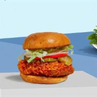 Firey Spicy Sandwich · Crispy fried chicken, sliced tomatoes, shredded lettuce, jalapenos, and hot sauce. Served on...