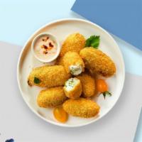 Holy Jalapeno Poppers · Fried jalapeños filled with gooey melty cheese, your choice of sauce.
