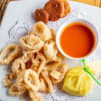 Calamari & Zucchini Fritti · Deep fried calamari and Italian squash, served with marinara sauce.