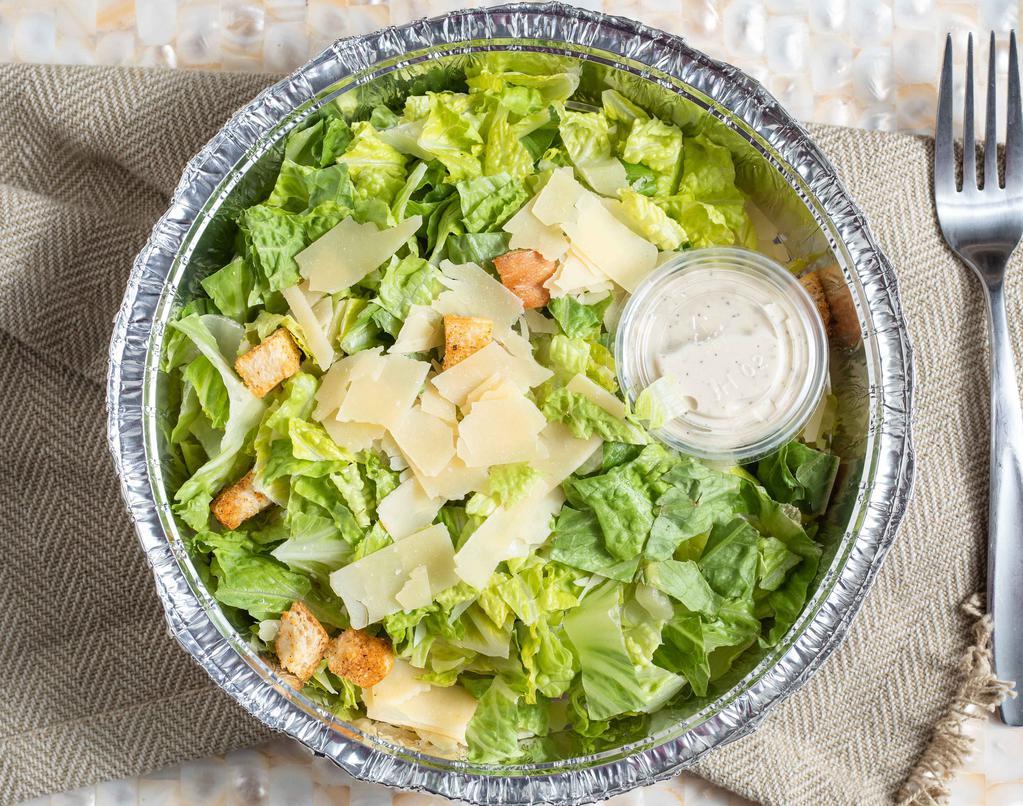 Insalata Di Cesare · Hearts of romaine with croutons tossed in traditional Caesar dressing, and topped with shaved Parmigiano.