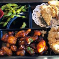 Orange Chicken Bento · Served with California Roll, Salad, Edamame, Miso Soup, Steamed Rice and Choice of Side.