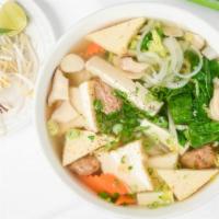 Pho (Traditional Vietnamese Soup) · A mouth-watering healthy noodles soup made with tofu. Roasted ginger, shallots and over 10 h...