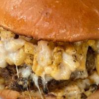 Mac N Bac · A juicy double-patty layered with our macaroni bacon hash topped with muenster jack cheese<b...