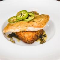 Grilled Chicken Breast · Mary's air chilled, crispy parmesan risotto cake, lemon jalapeño caper sauce