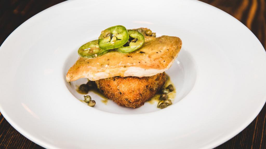Grilled Chicken Breast · Mary's air chilled, crispy parmesan risotto cake, lemon jalapeño caper sauce