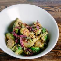 Brussels Sprouts · caramelized, pomegranate molasses, creme fraiche, red beet