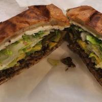 Torta · frijol, queso, lechuga, jitomate, jalapenos y aguacate (beans, cheese, lettuce, tomato, jala...