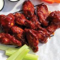 6Pc Wings.^ · 6 ct Traditional Bone in Wings with choice of wing sauce, and side. dipping sauce.