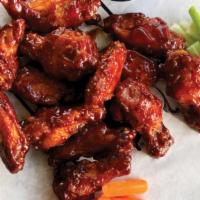20Pc Wings.^ · 20 ct Traditional Bone in Wings with choice of wing sauce, and side. dipping sauce.